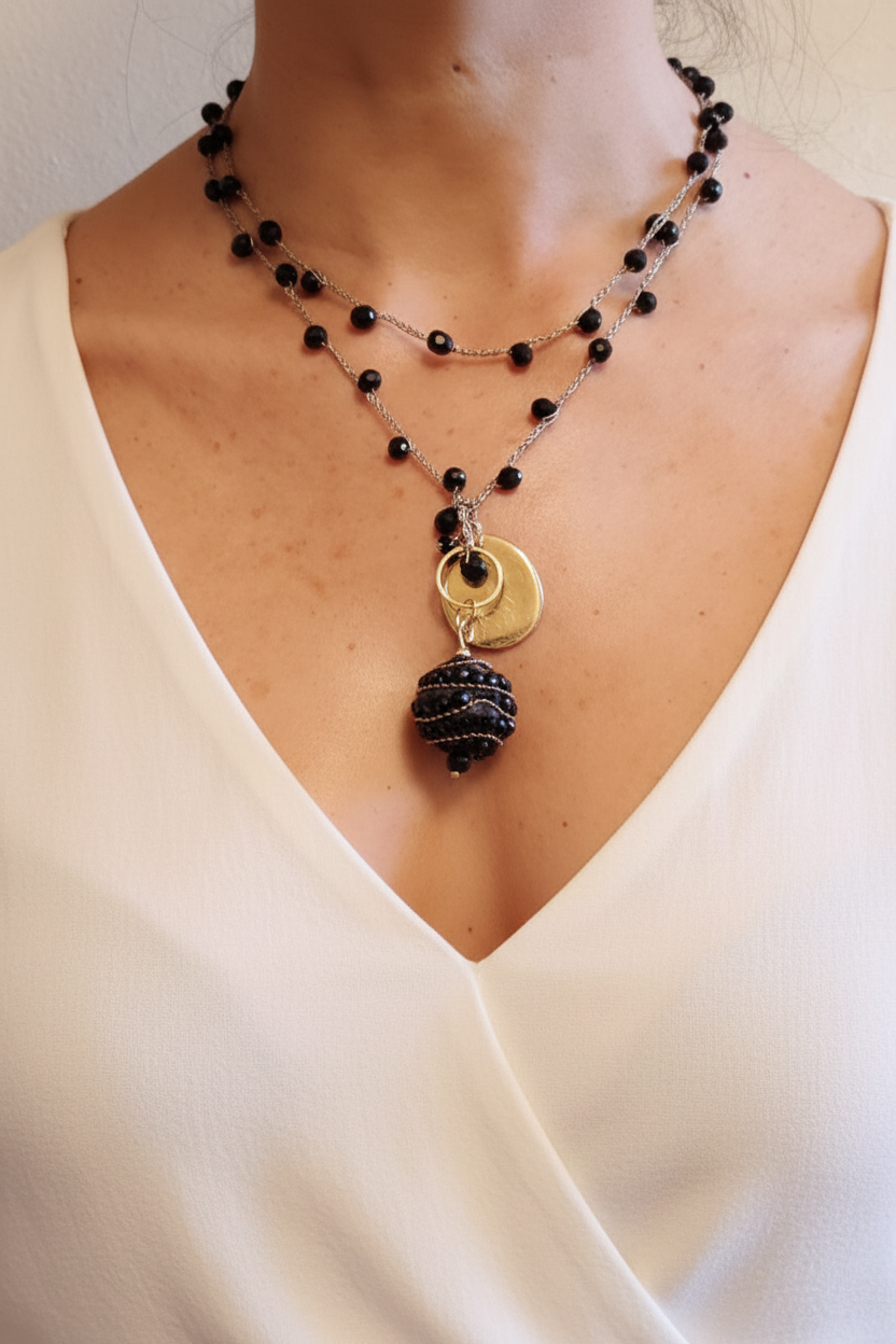 Collana ciondolo nero e dorato