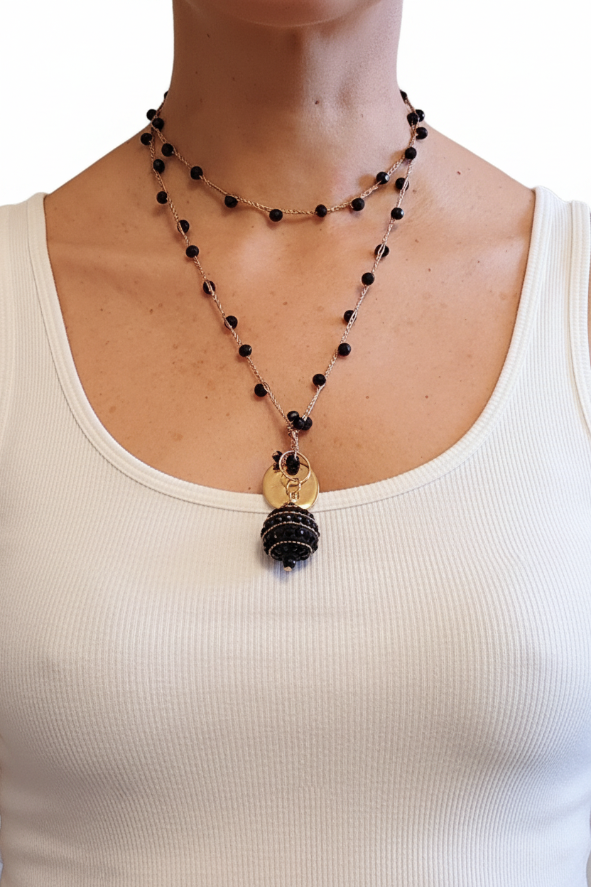 Collana ciondolo nero e dorato