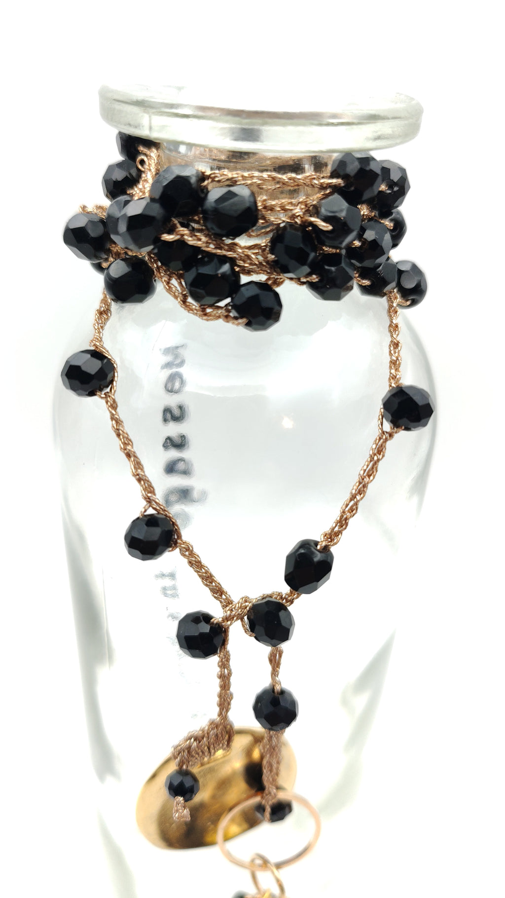 Collana nera con palla brillante