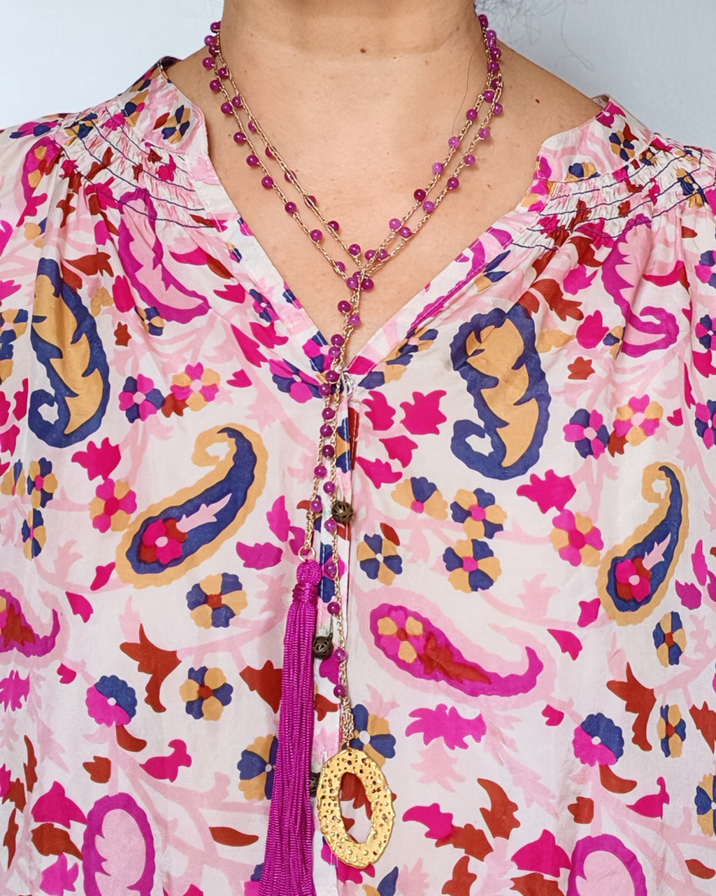 Collana fucsia con nappa